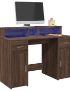 vidaXL Бюро с LED осветление Кафяв дъб 120x55x91 см инженерно дърво