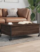 vidaXL Маса за кафе с колелца кафяв дъб 91x55x34 см инженерно дърво
