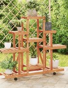 vidaXL Поставка за цветя с колелца 110x25x101 см масивна ела