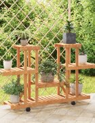 vidaXL Поставка за цветя с колелца 110x25x78 см масивна ела