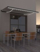 vidaXL Ръчно прибиращ се сенник с LED 450x300 см кремав