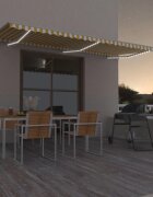 vidaXL Ръчно прибиращ се сенник с LED 600x350 см жълто и бяло