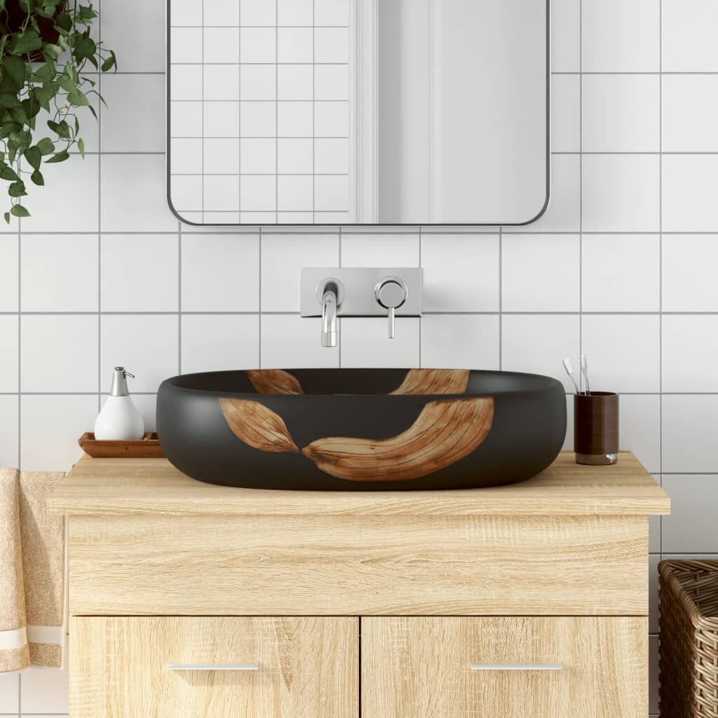 vidaXL Мивка за плот черна овална 59x40x14 см керамика