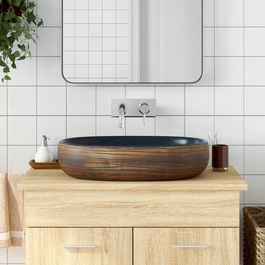 vidaXL Мивка за плот черно и синьо овална 59x40x14 см керамика
