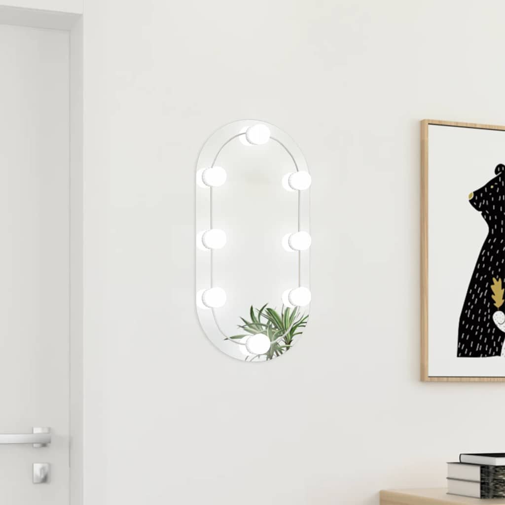 vidaXL Огледало с LED лампи 60x30 см стъкло овално