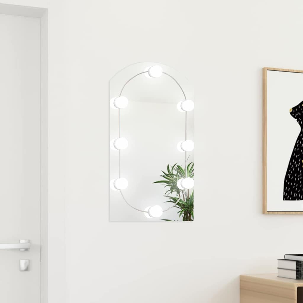 vidaXL Огледало с LED лампи 70x40 см стъкло арка