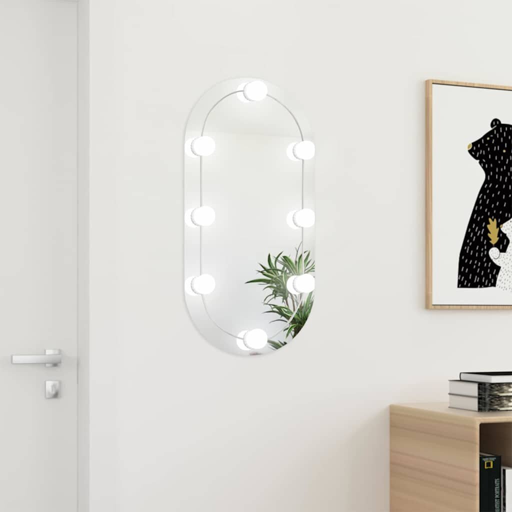 vidaXL Огледало с LED лампи 80x40 см стъкло овално