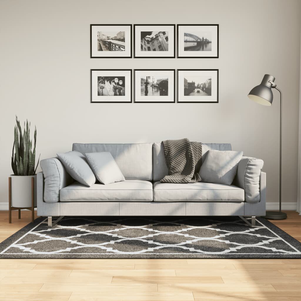 vidaXL Перящ се килим черно и бяло 120x180 см