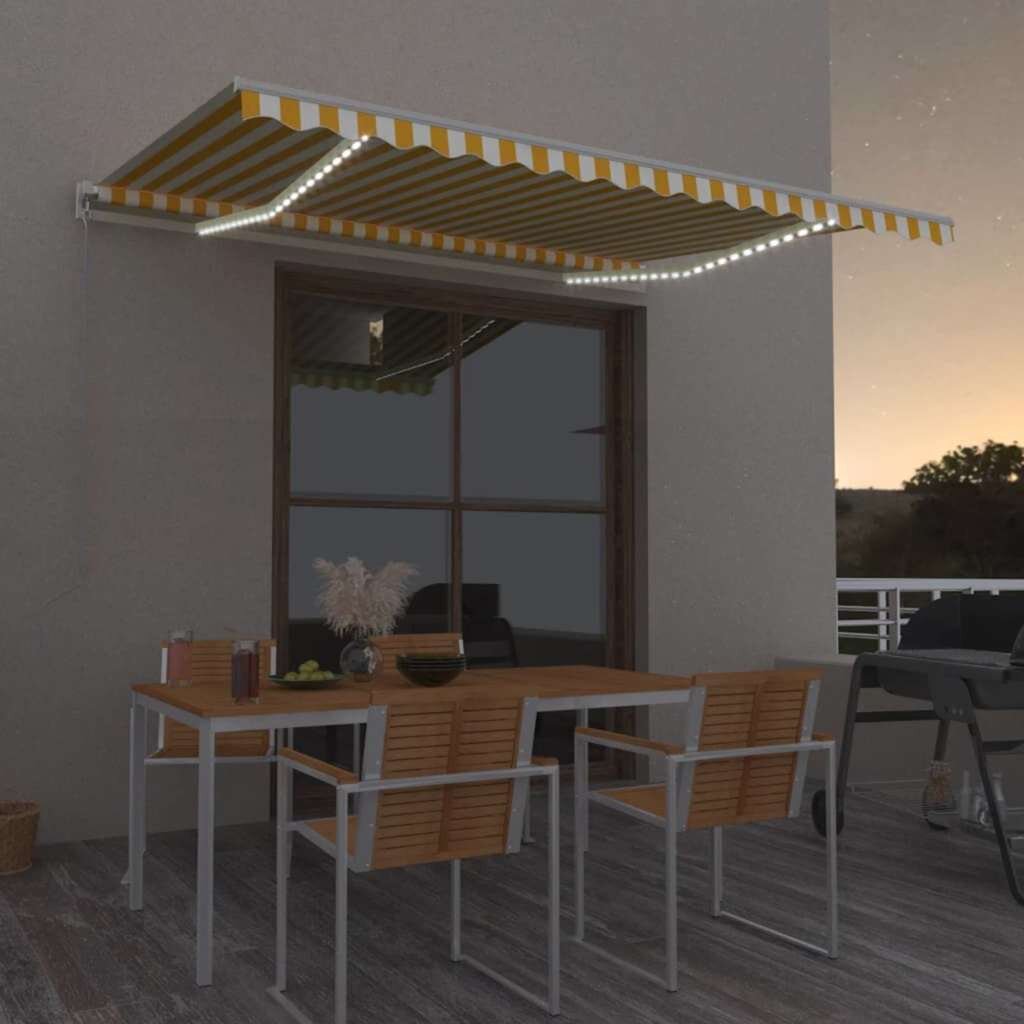 vidaXL Ръчно прибиращ се сенник с LED 450x350 см жълто и бяло