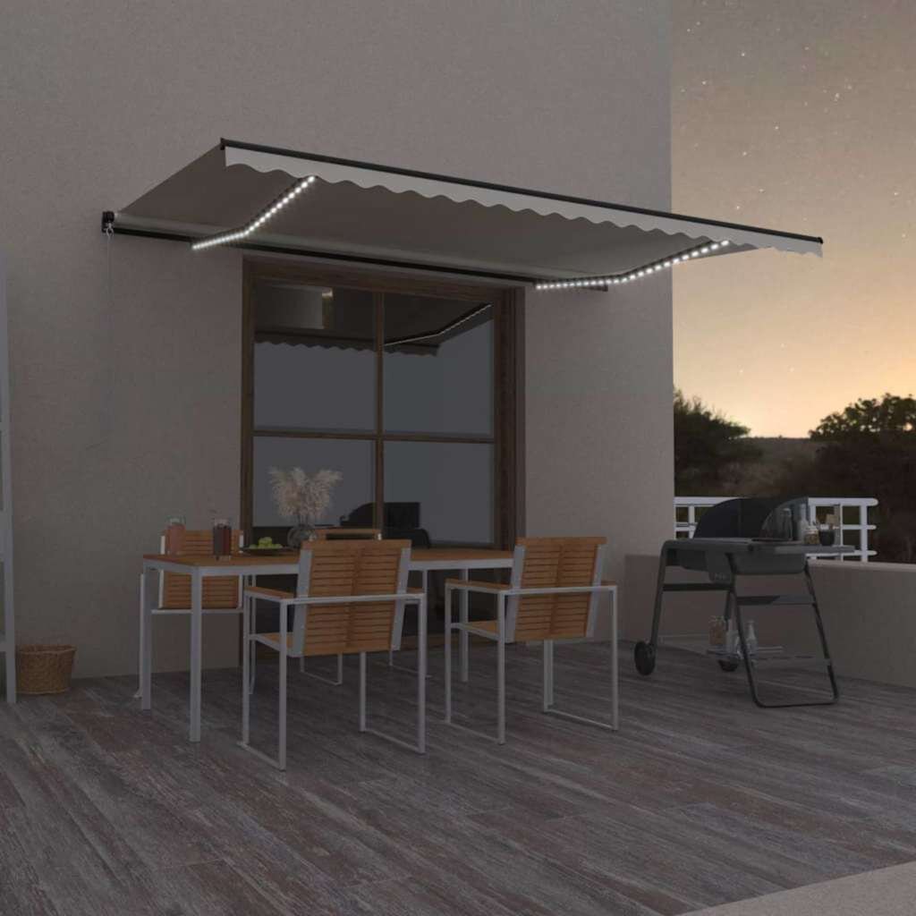 vidaXL Ръчно прибиращ се сенник с LED 500x300 см кремав