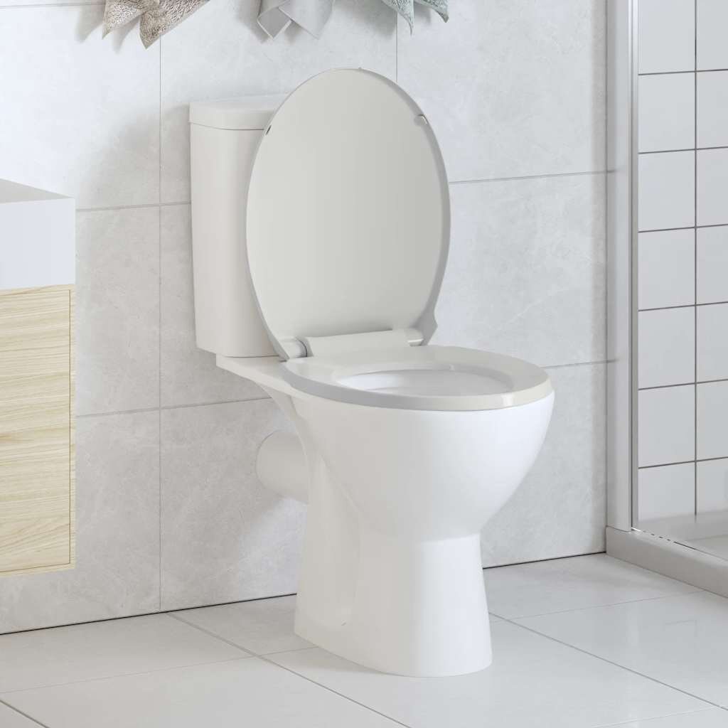 vidaXL Тоалетна седалка с плавно затваряне бяла овална
